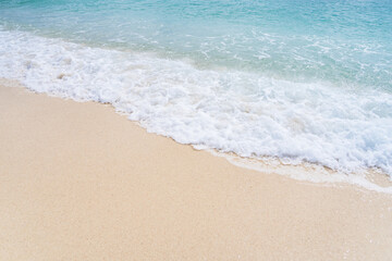 Fototapeta na wymiar Beautiful wave of ocean on the beach.