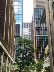 Fototapeta premium High-rise towers at the central Tokyo Japan, Otemachi district, offices and restaurants, sunny weekday year 2022 June 13th