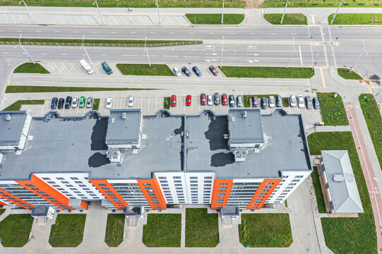 aerial view of the modern residential neighborhood. apartment building with outdoor parking lot.