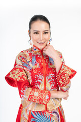 Portrait of a young asian Chinese female lady model wearing red traditional vintage wedding dress costume smiling and posing with different poses and gestures 