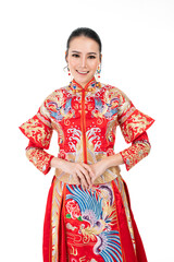 Fototapeta premium Portrait of a young asian Chinese female lady model wearing red traditional vintage wedding dress costume smiling and posing with different poses and gestures 