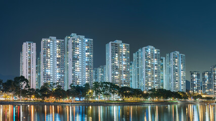 Fototapeta na wymiar high rise Residential building in Hong Kong city at night
