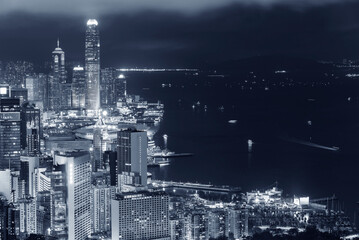 Night scenery of downtown district and Victoria Harbor of Hong Kong city