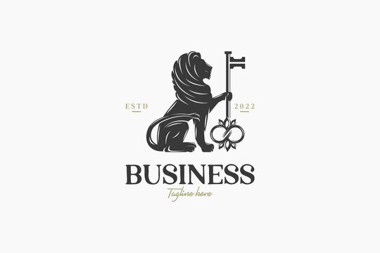 Lion logo with illustration of a lion holding a key