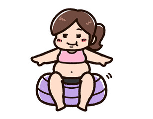 バランスボールに乗る肥満の女性