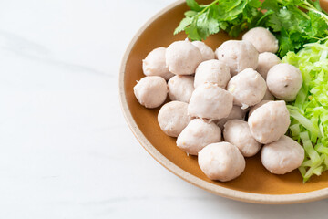 pork meatball with vegetable and spicy sauce