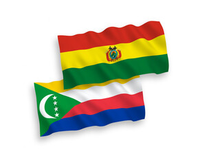 Flags of Union of the Comoros and Bolivia on a white background