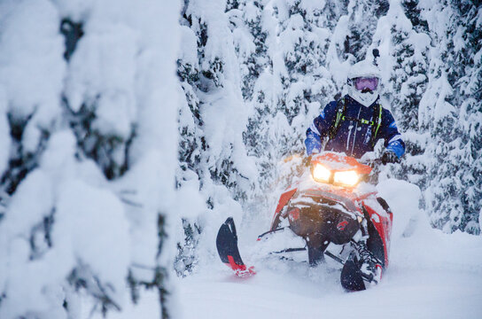 Alaska snowmachine rider in Alaskan backcountry
