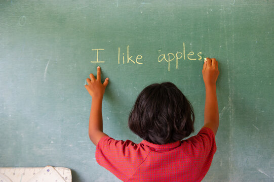Students doing exercises on the blackboard