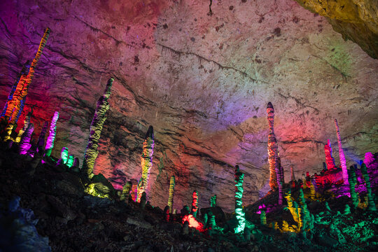 Colorful ceiling in the Huanglong cave, the pillars of the stalactites and stalagmites in Zhangjiajie, Hunan, China, background, wallpaper, copy space for text