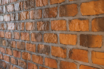Brick wall in red and brown. Texture