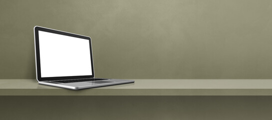 Laptop computer on green shelf background banner