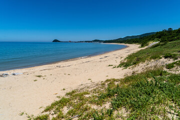 Sand beach and waves in countryside of  Japan.