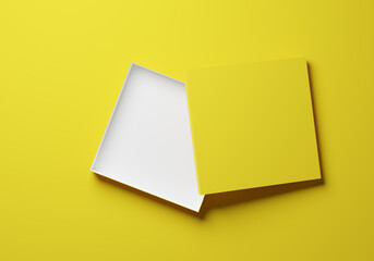 Open yellow gift box or package on a yellow background