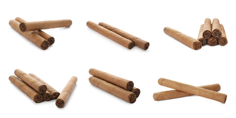 Set of cigars wrapped in tobacco leaves on white background. Banner design
