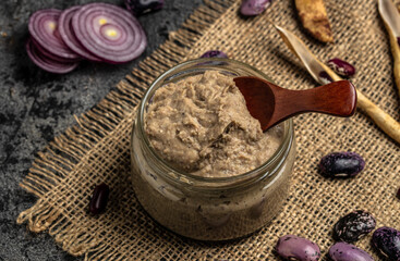 Homemade mushroom and bean paste. Mexican cuisine pate of beans, healthy vegetarian food, banner, menu, recipe place for text, top view