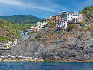Brightly coloured architecture in Manarola. Cinque Terre, Liguria, Italy.