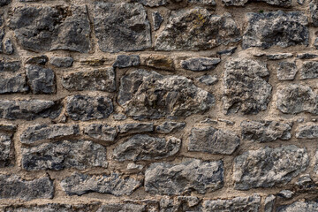 Rough stone wall texture. Abstract background for design purpose. Grey color