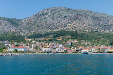 Fototapeta na wymiar Ionian Sea, Greece-05.24.2022. A general view from the sea of the port town of Astakos on the Greek Ionian coast.