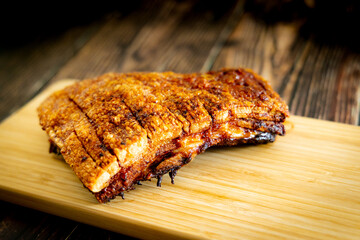 crispy pork belly on woodcutting bord