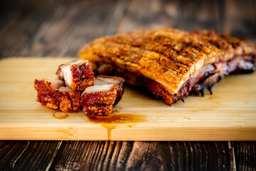 crispy pork belly on woodcutting bord