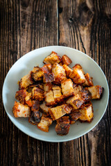 crispy pork on wooden table