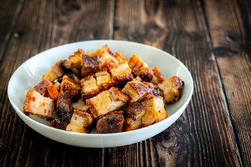 crispy pork on wooden table