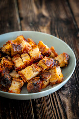 crispy pork on wooden table