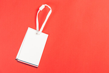 white price tag on a red isolated background, price tag for goods