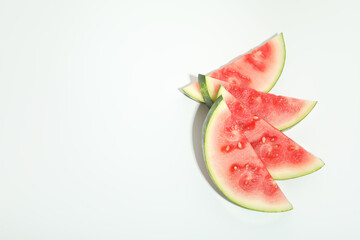 Fresh and juicy watermelon slices on white background