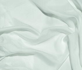 Obraz premium White cloth curve. texture of silk, satin. Shiny fabric background and copy space.