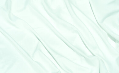 White cloth curve. texture of silk, satin. Shiny fabric background and copy space.