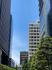 The city corners at the high-rise central downtown business district of Tokyo Japan, Otemachi, year 2022 June 13th sunny weekday