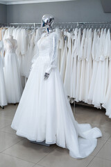 Beautiful wedding bridal dresses on mannequin in showroom