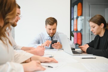 Business people working on project in office