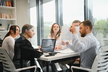 Group of young people in business meeting