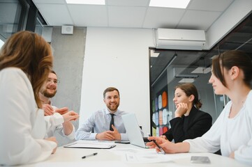 Group of young people in business meeting