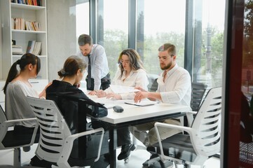 Group of young people in business meeting