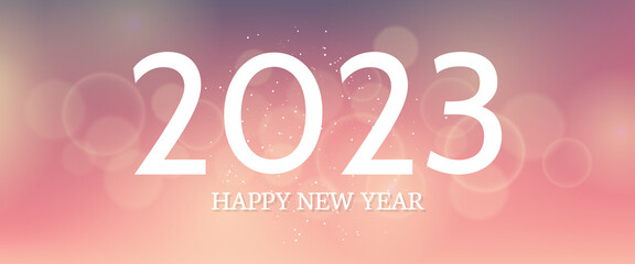 Happy new year 2023 incription on blurred background