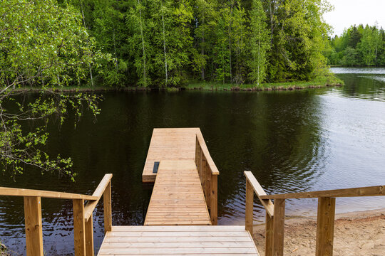 Modern Wooden Staircase From Sauna Cabin To Lake In Finland