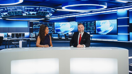 TV Live News Program: Two Professional Presenters Reporting On the Events. Television Cable Channel...