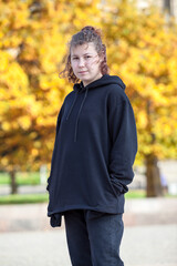 Teen girl portrait wearing black clothes, outdoor