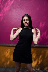 Sensual young latin woman posing in mexican town