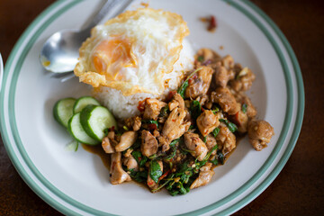 Asian-style stir-fried basil chicken with rice