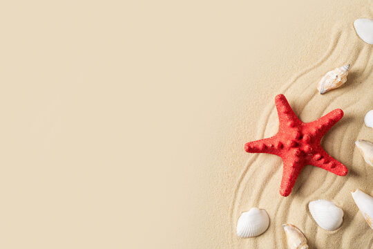 Summer vacation and beauty sand mock up with shell, starfish and sand on beige background,
