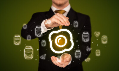 Hand holding food related icons