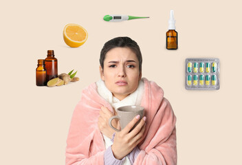 SIck woman with cup of hot drink surrounded by different drugs and products for illness treatment on beige background