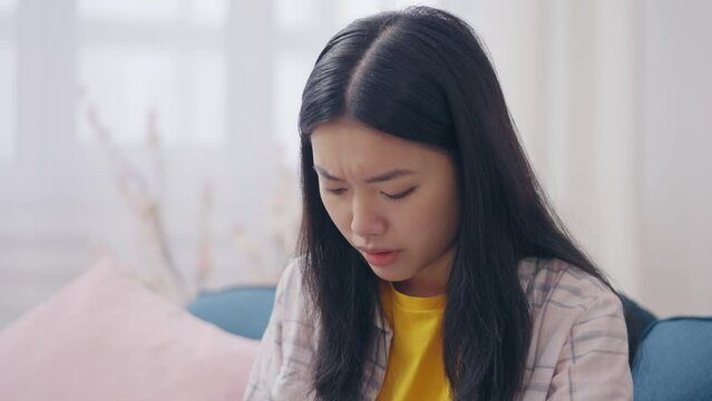 Displeased Asian Woman Having Problems With Online Payment, Financial Scam