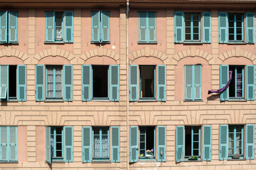 The facades of building in the city of Nice, French provence.