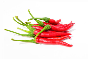 Bunch of fresh red chilli peppers isolated on white background